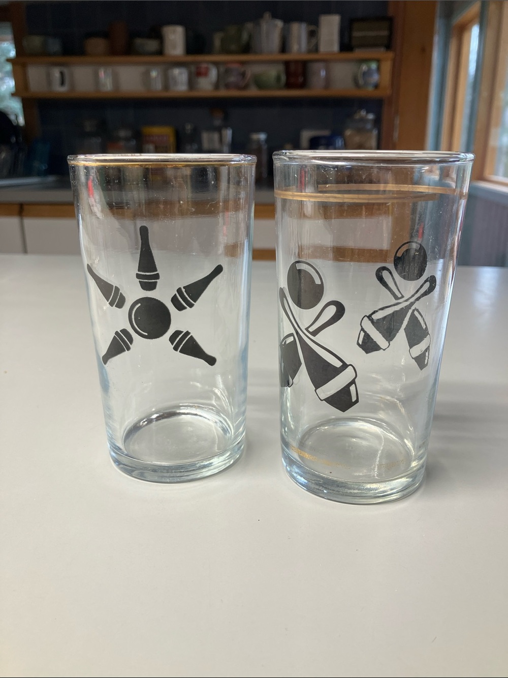 Two vintage bowling glasses